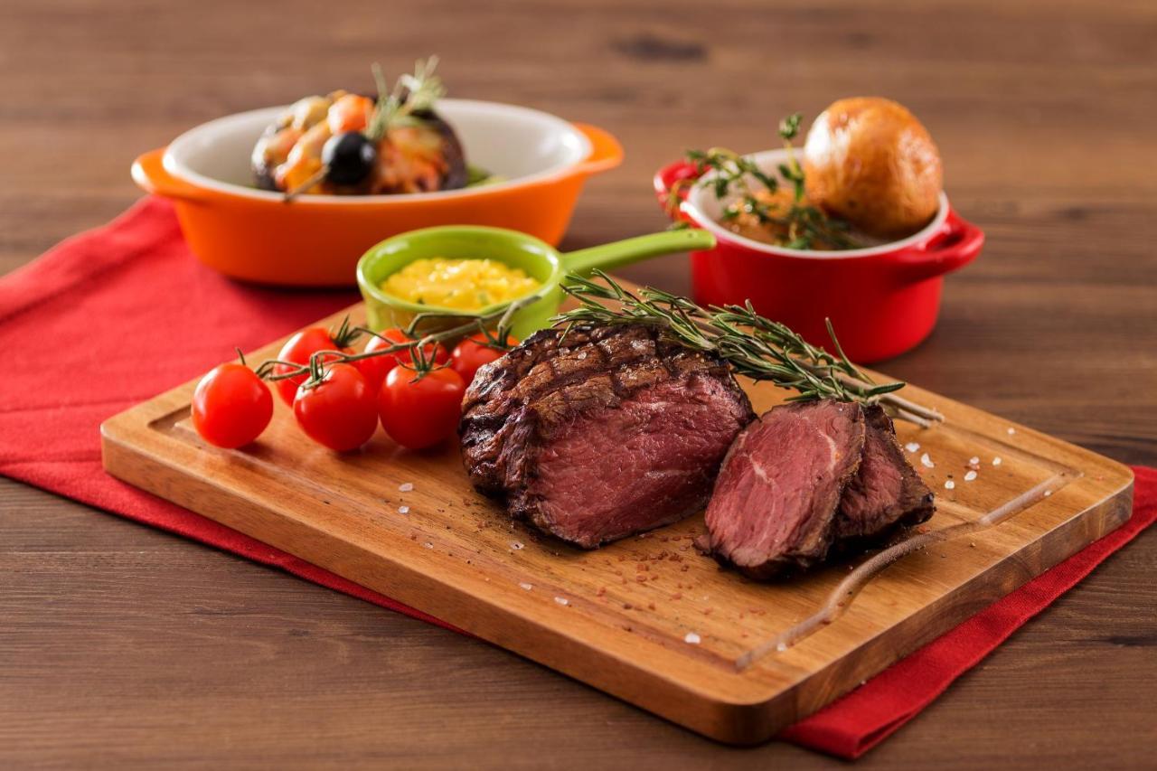 Hong Kong Gold Coast Hotel Exterior photo A steak prepared with the dry-aging technique
